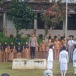 Kanit Reskrim Polsek Batang Toru, Ipda Ery J Situmorang, saat menjadi Pembina Upacara