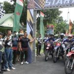 Danyonif 123/RW, Letkol Inf Emick Chandra Nasution, diwakili Wadanyon, Mayor Inf Anantona Zebua, saat melepas even olahraga Motocross jelajah Alam bertajuk Rajawali Adventure dari Kompi Senapan C, Gunung Tua, Kabupaten Paluta