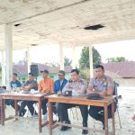 Personel Polsek SD Hole di antaranya, Aipda M Ihsan, Aipda Parulian Siregar, dan Brigadir Michael V Sibarani, melaksanakan pengamanan Turnamen Sepak Bola Cup II Bersama Kepala Desa se-Kecamatan SD Hole