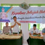 Kasat Resnarkoba Polres Tapsel, AKP Salomo Sagala, memberi arahan dan motivasi ke masyarakat agar jangan gentar dan takut hadapi bandar narkoba di sela gerakan Kapolres Jelajah Huta