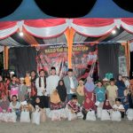 Paslon Bagusi (Gus Irawan Pasaribu-Ja'far Syahbuddin Ritonga) bersama Ketua MPC PP Tapsel, Rocky AP Gultom, usai menyerahkan santunan ke anak yatim keluarga besar PP