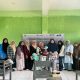 Tim Pengabdi foto bersama dengan mitra kelompok UMKM Udana