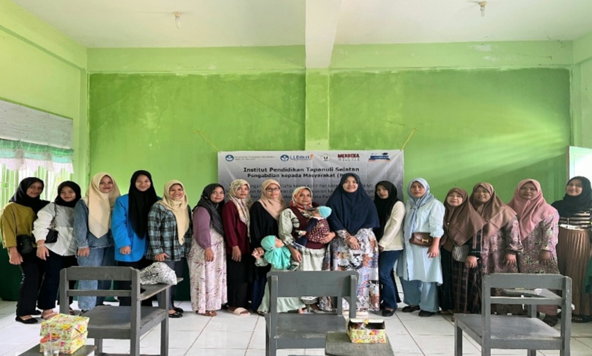 Tim Pengabdi foto bersama dengan mitra kelompok UMKM Udana