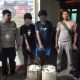 Kedua pria terduga maling getah karet milik PTPN IV Regional I Kebun Hapesong, KA dan A, usai diserahkan pihak keamanan Perusahaan ke Polsek Batang Toru untuk diamankan