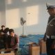 Personel Polsek Padang Bolak saat mengawal proses pelipatan dan penyortiran surat suara pemilihan Gubernur dan Wakil Gubernur Sumatera Utara di Gudang KPU Paluta