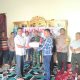Bhabinkamtibmas Polsek Padang Bolak saat menghadiri Musrenbang dan penyusunan RKPD TA 2025 di Desa Payabaung
