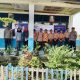 Bhabinkamtibmas Polsek Batang Toru, Aiptu Hilman S Harahap, dan Aiptu Akhsan Chatib Lubis, di sela sosialisasi ke SMPN 1 Muara Batang Toru untuk mendaftar ke SMA Kemala Taruna Bhayangkara