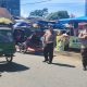 Sejumlah personel Pos Lantas Batang Toru, Polres Tapsel, tampak siaga menggelar Patroli bertajuk Police Go to Market di Pekan atau Pasar Jumat