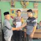 Kedua belah pihak atas kasus dugaan pemalsuan tekenan Kades Simaninggir saling bermaaf-maafan ditandai dengan bersalam-salaman