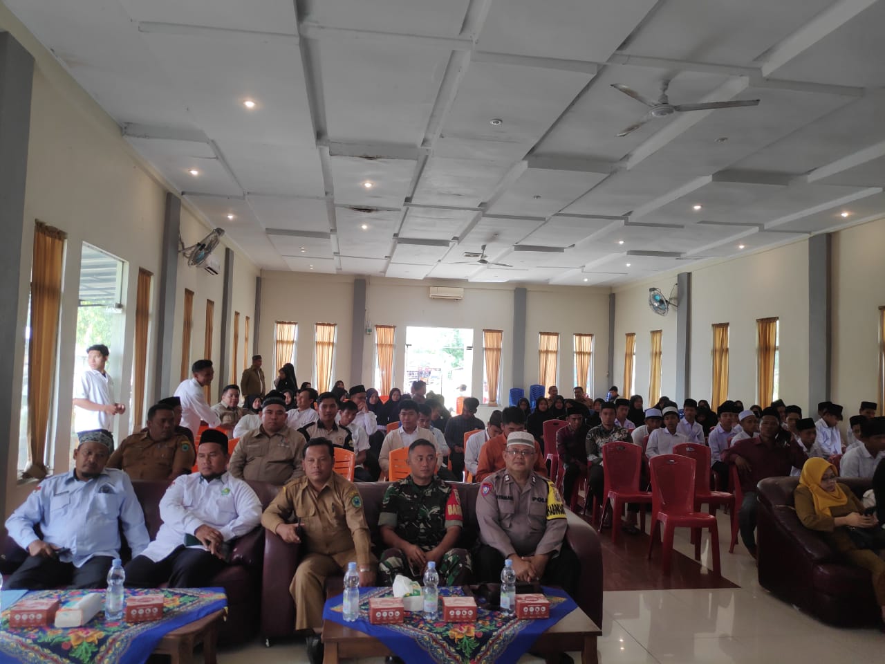 Bhabinkamtibmas Polsek Padang Bolak, Aiptu Sayaman Siregar, hadiri pelantikan PD JPRMI Paluta