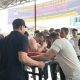 Kasat Lantas Polres Tapsel, AKP Danil Saragih, bertanding melawan Kasatpol PP, Jhonni Gumansi Nasution, dalam kejuaraan panco yang digelar Agy Gym Sitamiang