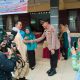 Kapolsek Sipirok, Iptu Aswin Manurung, dan Forkopimcam menyambut kedatangan Bupati Tapsel, Gus Irawan Pasaribu, dan rombongan dalam Musrenbang Kecamatan Angkola Timur