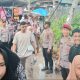 Sejumlah personel Polres Tapsel tampak siaga melakukan pengamanan guna mengantisipasi terjadinya Pungli di Objek Wisata Aek Sijorni