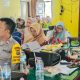 Bhabinkamtibmas Polsek Batang Angkola, Aipda Ambosa Pasaribu, menghadiri musyawarah Desa khusus pembentukan Koperasi Merah Putih