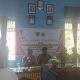 Bhabinkamtibmas Polsek Batang Angkola, Aiptu D Tampubolon, saat memberikan pesan Kamtibmas di sela musyawarah Desa khusus terkait program Ketapang dan pembentukan Koperasi Merah Putih