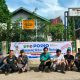 Bhabinkamtibmas Polsek Batang Toru, Bripka Adi Suito, menggelar sambang dan tatap muka sekaligus memasang spanduk Kampung Bersinar di depan Kantor Desa Telo