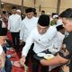 Bupati Tapsel, Gus Irawan Pasaribu, saat tepung tawari Calhaj