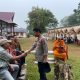 Kapolsek Padang Bolak, AKP Muallim Harahap, sambil Patroli turut menyapa sejumlah umat Buddha yang datang ke Candi Bahal dalam rangka perayaan Hari Raya Waisak 2569 BE
