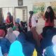 Bhabinkamtibmas Polsek Sipirok, Aiptu B Silalahi, mendampingi tenaga kesehatan dari Puskesmas Hanopan dalam rangka pengobatan gratis ke masyarakat di Desa Dalihan Natolu