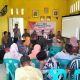 Bhabinkamtibmas Polsek Padang Bolak, Bripka Dedi Hasibuan, hadiri musyawarah khusus terkait pembentukan Koperasi Merah Putih di Balai Desa Bara