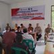 Bhabinkamtibmas Polsek Padang Bolak, Aipda Martua Siregar, menghadiri musyawarah Desa khusus terkait ketahanan pangan dan pembentukan Pengurus Koperasi Merah Putih