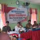 Bhabinkamtibmas Polsek Batang Angkola, Aiptu Ambosa Pasaribu, saat hadiri musyawarah khusus terkait pembentukan Koperasi Merah Putih di Desa Tahalak Ujung Gading