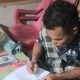 Abdul Hadi Siregar, seorang pria selaku penulis status kontroversial terkait SPj Desa Aek Sabaon menandatangani surat perjanjian damai usai dimediasi Bhabinkamtibmas Polsek Batang Toru, Aipda Zedda Zega