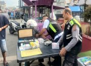 Panas Jalanan Tak Halangi Polres Tapsel Memberi Layanan Kesehatan Gratis