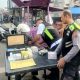 Sidokkes Polres Tapsel saat memberi layanan pemeriksaan dan pengecekan kesehatan gratis bagi pengemudi mopen, becak bermotor, maupun masyarakat umum dalam rangka menyambut HUT Bhayangkara ke-79