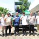 Bupati Tapsel, Gus Irawan Pasaribu, bersama Anggota Komisi I DPR RI Sabam Rajagukguk, Wakil Ketua DPRD Tapsel Abdul Basith Dalimunthe, Wakil Ketua DPRD Padangsidimpuan Rusydi Nasution, Kapolres Padangsidimpuan AKBP Wira Prayatna, di sela penyerahan bantuan Alsintan berupa satu unit Combine Harvester