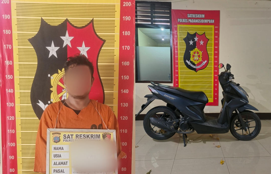 Seorang pria yang diduga pelaku Curanmor, HL, usai ditangkap Tim Opsnal Sat Reskrim Polres Padangsidimpuan berikut barang bukti sepeda motor