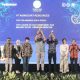 Director & CFO Agincourt Resources, Noviandri (tengah) berfoto bersama dengan manajemen perusahaan, dewan juri, dan pembicara saat menerima dua penghargaan Top CSR Awards 2025 di Jakarta