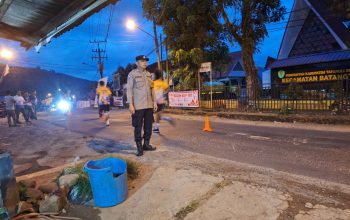 Personel Polsek Batang Toru saat pengamanan Martabe Run 2025