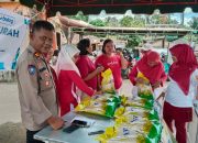 Kasat Binmas Polres Tapsel, Iptu Taufik Manullang, di sela kegiatan penyaluran beras murah dalam rangka GPM ke masyarakat Angkola Timur