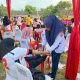 Tim Medis Sidokkes Polres Tapsel saat memberikan pelayanan kesehatan di gelaran Turnamen Volly Cup Bhayangkari Sumut