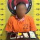 Seorang pria yang diduga menjadi pengedar sabu berinisial, MH, usai ditangkap Tim dari Sat Resnarkoba Polres Tapsel di pondok belakang rumahnya